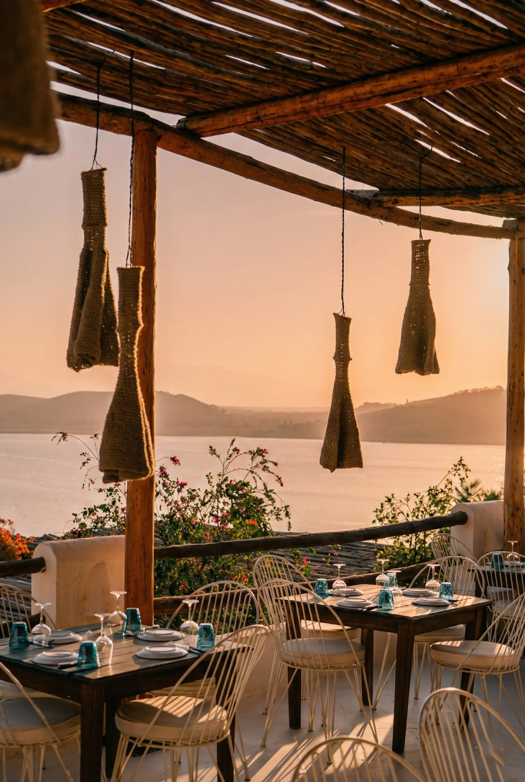 Chic Lakefront Dining Terrace at Casa Lalla Chic Ibiza-style lakefront terrace at Casa Lalla Takerkoust offering stunning waterfront views