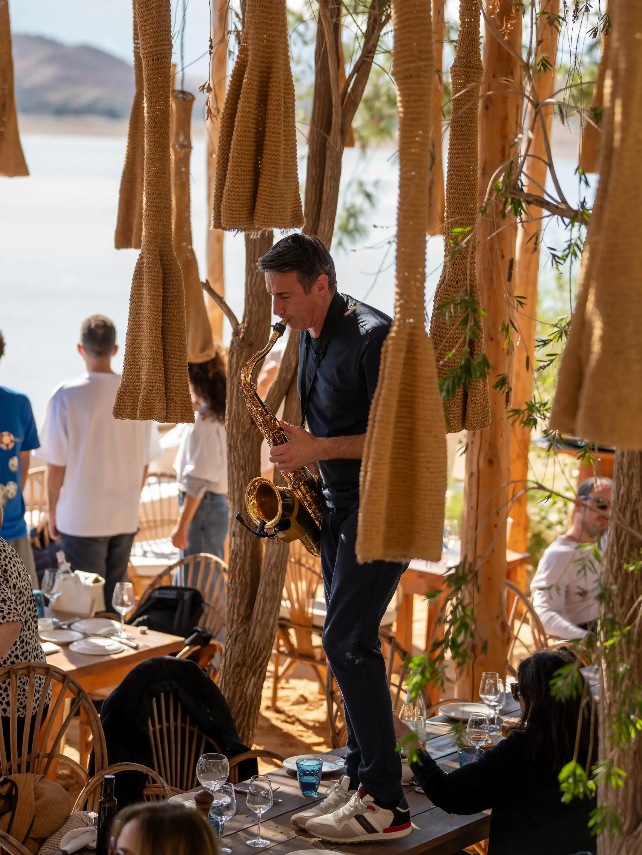 Relaxing outdoor swimming pool overlooking the breathtaking Lalla Takerkoust Lake and desert landscape.