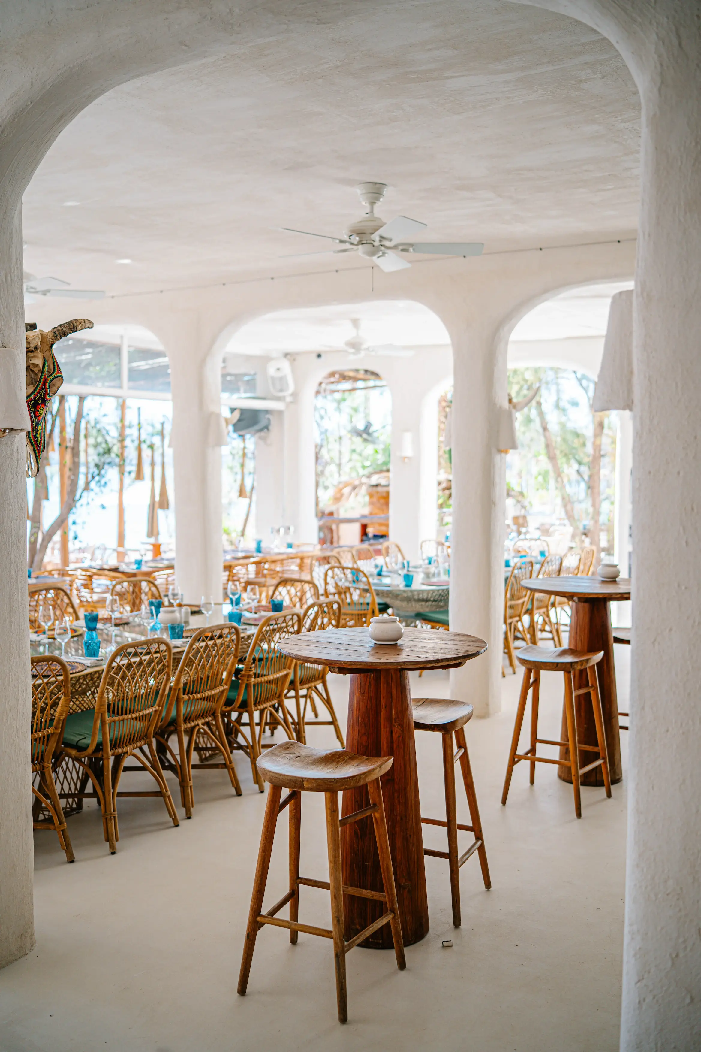 Luxury dining arrangement for an Agafay wedding or private events, showcasing Ibiza Mykonos style decor and lighting